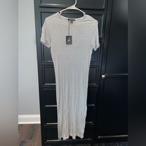 Women black and white stripe dress, still has tags.